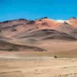 car-riding-in-bolivian-sunshine-landscape-C3AK7KW.jpg